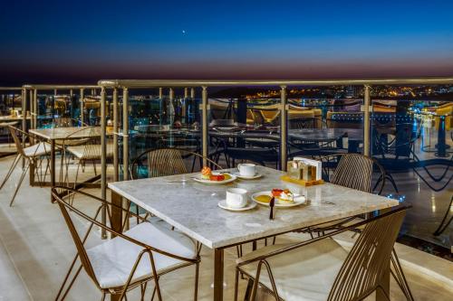 Балкон, Signature Blue Resort Kuşadası (Signature Blue Resort Kusadası) in Кушадаси