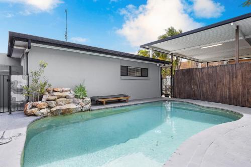 A Tranquil Sunshine Escape with Pool and Deck