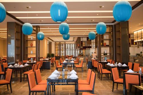 Wyndham Grand Plaza Royale Zhaotong - 레스토랑