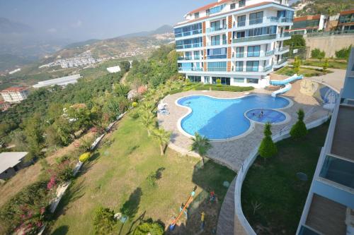 Flat with Sea View Shared Pool & Gym in Alanya - Apartment - Kargicak
