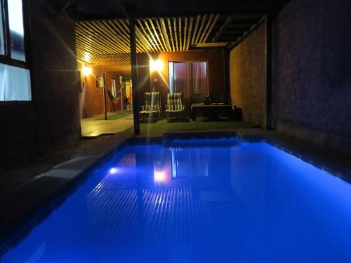 Zwembad, Hostal Kirckir in San Pedro de Atacama