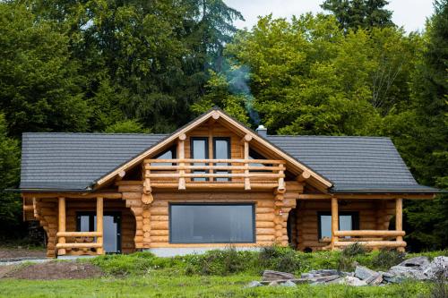 Harghita Log Houses - Accommodation - Izvoare