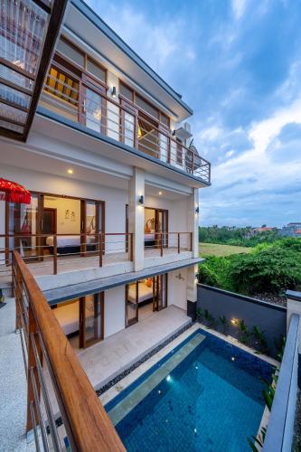 Kasmaran Bali Guest House - Tap to explore photos