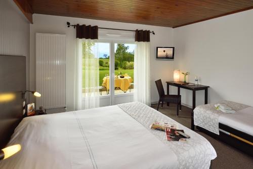 Book the Triple Room with Garden View Triple Room with Garden View
