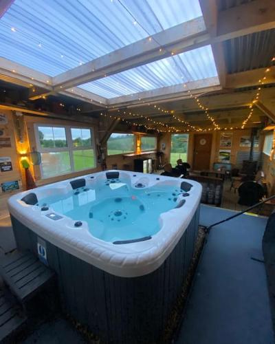 Sleeps 18 Double Decker Bus Hot Tub Sauna Cinema Pets in Irvinestown