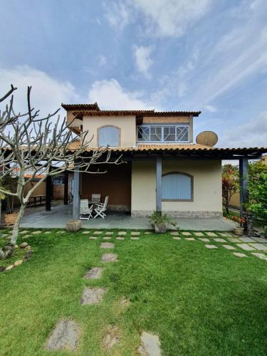 Casa aconchegante 200m da praia WIFI NETFLIX área gourmet externa muito conforto para até12 pessoas