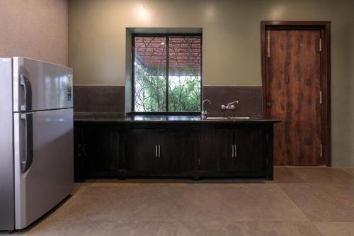 Kitchen, StayVista's Shivom Villa 12 - A Serene Escape with Views of the Valley and Lake in Lavasa