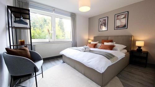 MILPAU Gladbeck 1 - Modernes und zentrales Premium-Apartment mit Privatparkplatz, Queensize-Bett, Netflix, Nespresso und Smart-TV