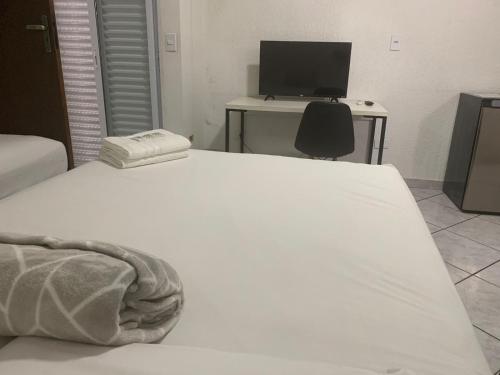 Pousada Internacional EAS 10min Aeroporto in กัวรุลฮอส