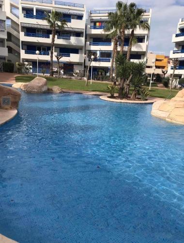 SUN TRAP terrace apartment, 4 pools, ground floor, parking at door