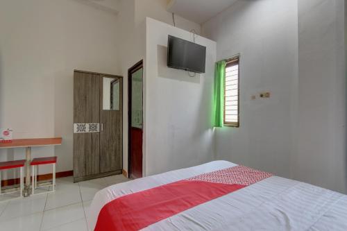 Capital O 91690 Moza Guest House