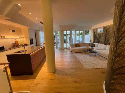 Luxuriöses Loft mit großer Sonnenterrasse & Sauna, Мюнхен (фото 4)