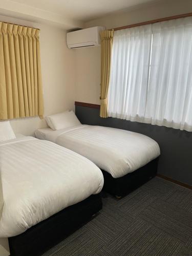 Karin Doo Hotel Room Type - Standard Twin Room