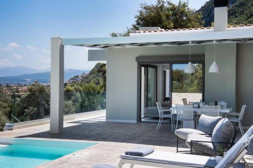 Villa Anthos - Fresh modern villa, pool, close to the beach, Città di Lefkada (foto 6)