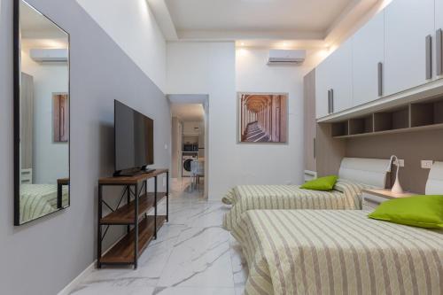 GuestHost - Mini Loft San Carlo a 5 min da MAMbo Bologna, Болонья (фото 10)
