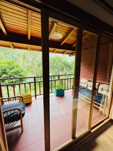 balkon/terras, Mama Tungu hostel in Banos