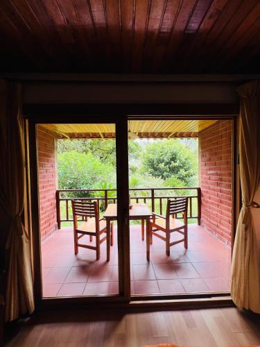 balkon/terras, Mama Tungu hostel in Banos