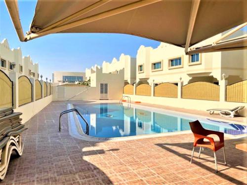 Serene Family villa with Pool near Khalifa Stadium