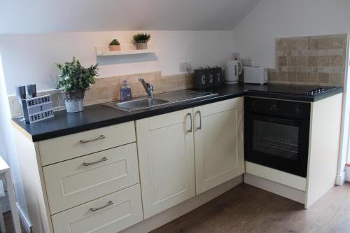 The Loft at Rock Cottage with hot tub in Templepatrick