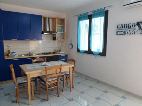 The Blue Lighthouse - Spiaggia di Su Port'e Su Trigu
