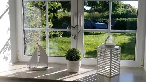 Thomsen - familienfreundliche Ferienwohnung mit großem Garten 9.1km von Janneby entfernt