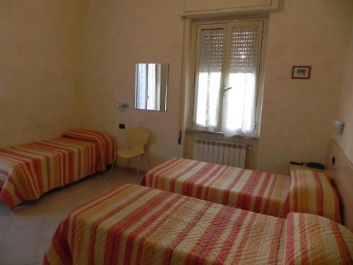 Hotel Villa Robinia Set in a prime location of Genzano Di Roma, Hotel Villa Robinia puts everything the city has to offer just outside your doorstep. The property features a wide range of facilities to make your stay a p