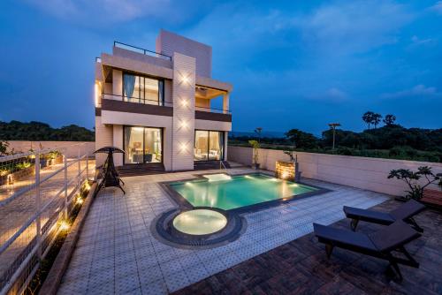 SaffronStays Nishta - 4BR pet-friendly villa with pool, turf, gazebo & terrace BBQ views in Alibaug
