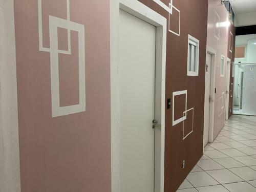 Pousada Internacional EAS 10min Aeroporto in กัวรุลฮอส