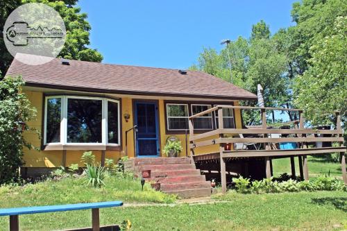 . The Riverfront Retreat