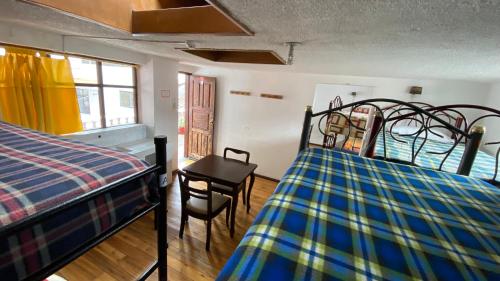 Bed in 10-Bed Mixed Dormitory Room room in Hostal La Guayunga RoofTop