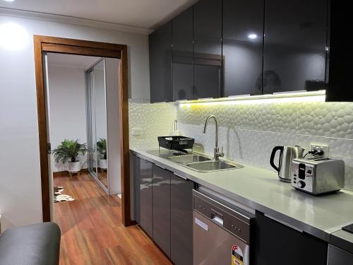 Modern home with water view - image 12
