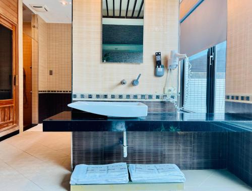 Ванная комната, Motel Fabulous in Городок Суао