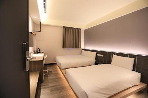 Habitación triple, vistas a la ciudad