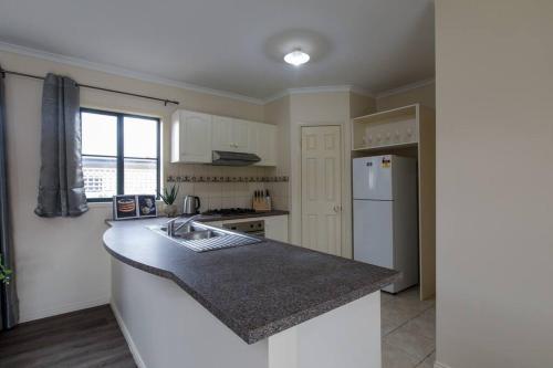 Heart of McKinnon Units by Ready Set Host in Caulfield