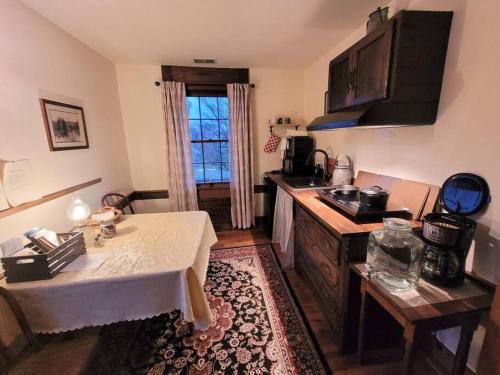 Upstairs Historic 1 Bedroom 1 Bath Suite with Mini-Kitchen, Porch & River Views in Elkins, USA
