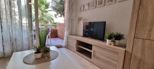  Comarruga Playa apartamento con piscina in Comarruga