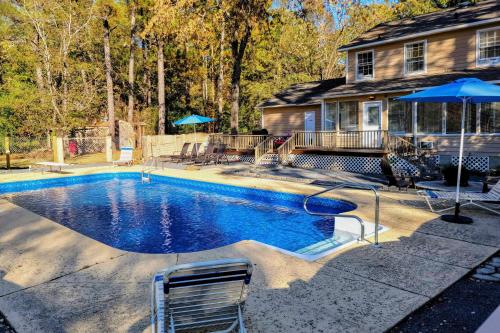 Lakefront Macon Home with Pool, Dock and Fire Pit!