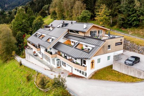Exterior view, der Sonnberg Alpinlodges - Apartments mit Seeblick, privater Sauna und Self Check-In in Zell Am See