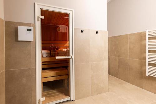 Sauna, der Sonnberg Alpinlodges - Apartments mit Seeblick, privater Sauna und Self Check-In in Zell Am See