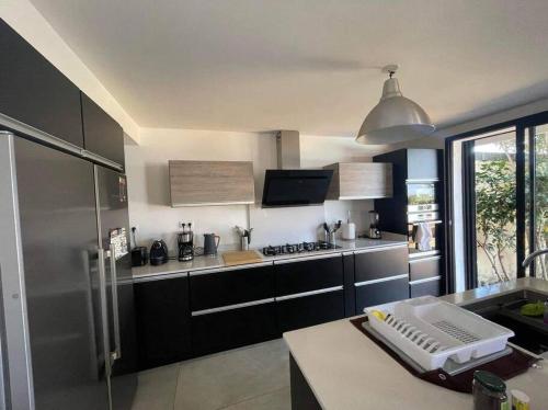 المرافق, La Villa Jujubes avec piscine chauffée - 5 chambres spacieuses (La Villa Jujubes avec piscine chauffee - 5 chambres spacieuses) in Saint Paul