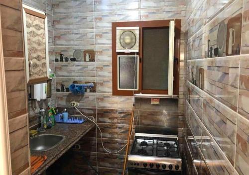 virtuve, AC, Wi-Fi Shahrazad Beach Apartment-1 in Agami