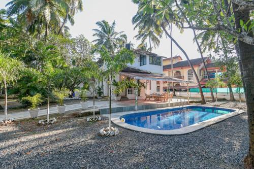 GR Stays WHITE HOUSE 4bhk Private Pool Villa in Calangute