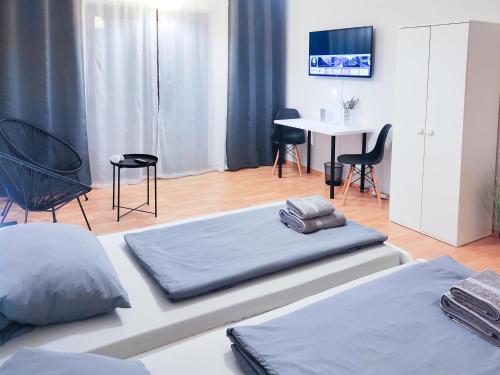 ALFA Apartment Stuttgart Mitte 2 Zimmer City-Lage Berliner Platz Balkon Netflix Küche WM l 2BR 5 Beds 6 People l Fully equipped Kitchen & Bathroom in Stuttgart, Deutschland