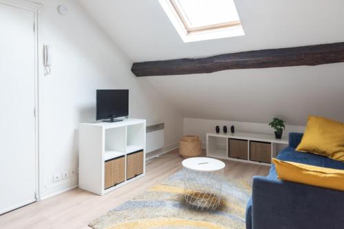 Attic apartment with exposed beams