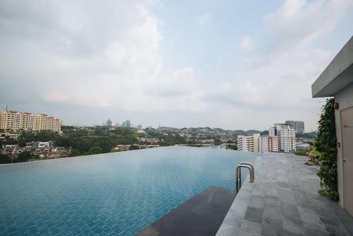 a large building with a view of the ocean, The Signature Hotel & Serviced Suites Kuala Lumpur in Kuala Lumpur