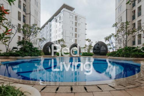 RedLiving Apartemen Bassura City - Vina Tan Tower Flamboyan, Jakarta