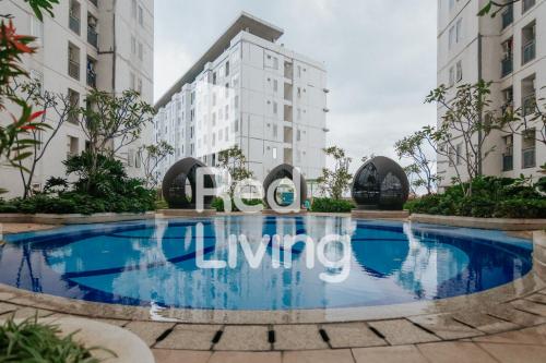 RedLiving Apartemen Bassura City - Vina Tan Tower Flamboyan