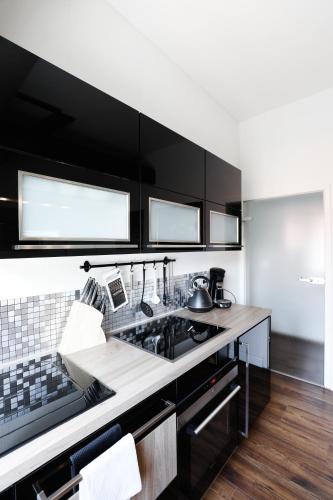 Konyha, BohnApartments Steigerwald - Natur in der Stadt - Vollausstattung - WLAN - Parkplätze (BohnApartments Steigerwald - Natur in der Stadt - Vollausstattung - WLAN - Parkplatze) in Lobervorstadt