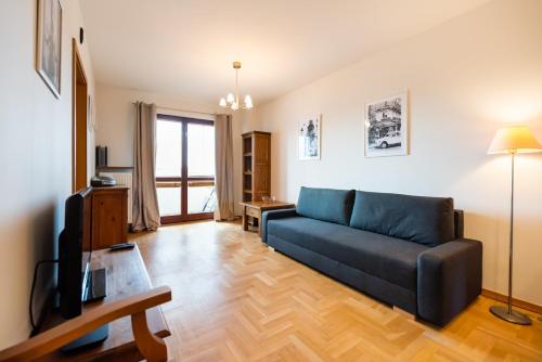 Woronicza Homey Wooden Apartment by BookingHost, Warsaw