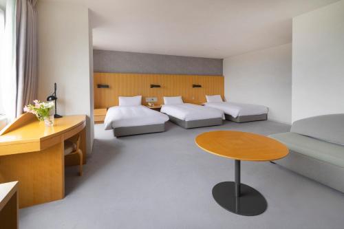 Premium Room with Three Single Beds and Two Single Sofa Beds